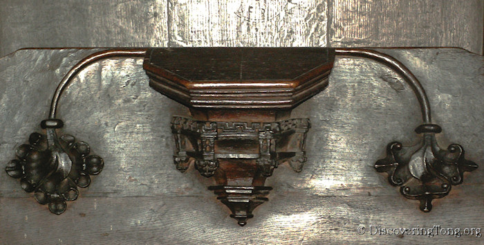 Choir Stall seat bracket showing a castle